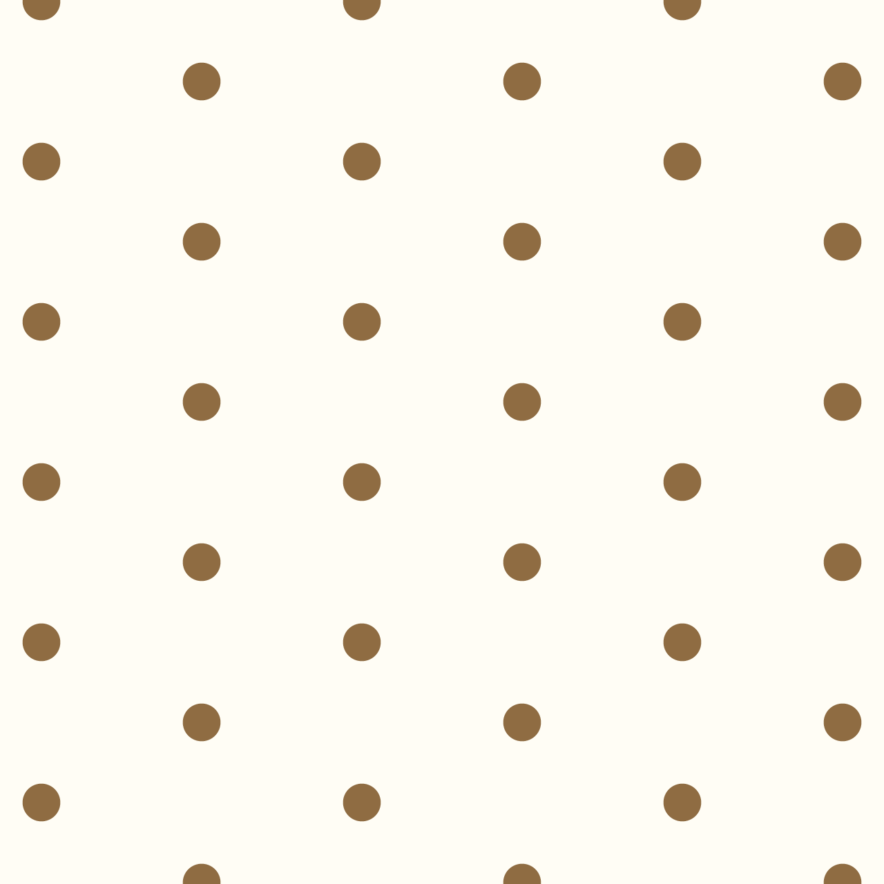 クリーム色の背景にシンプルな茶色のドットのパターン