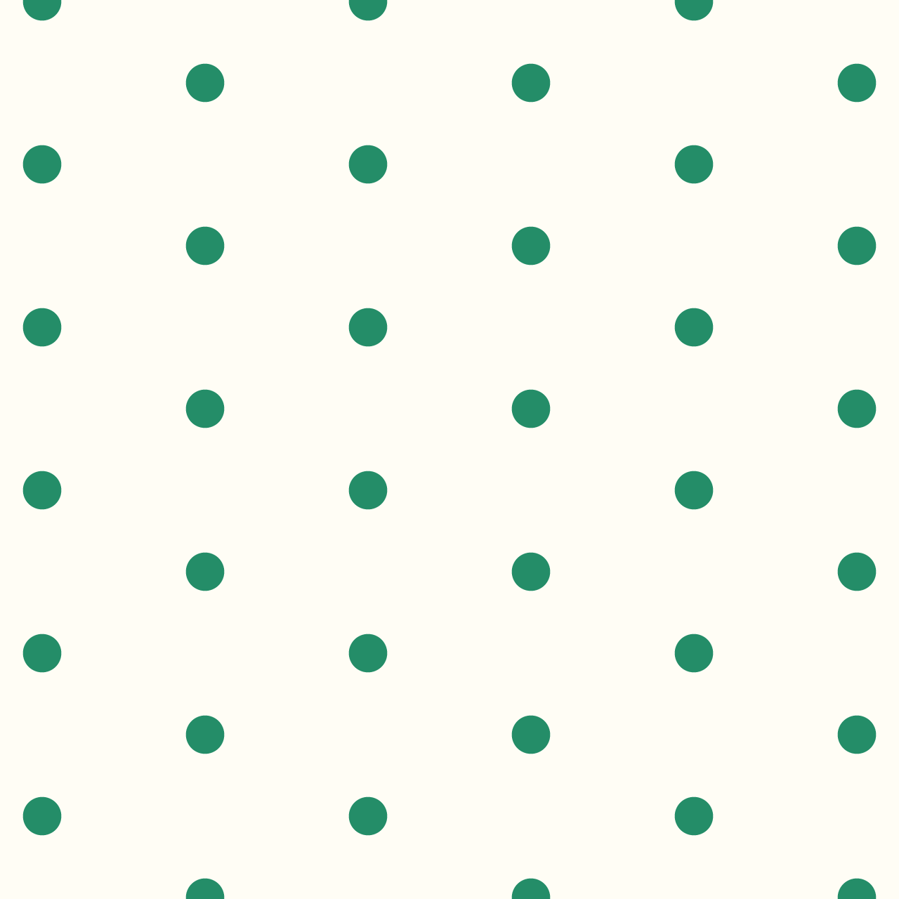 クリーム色の背景にシンプルな緑のドットのパターン