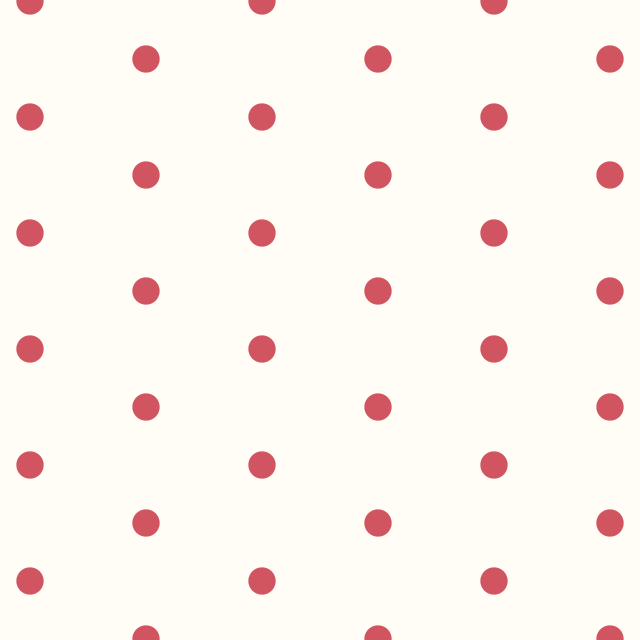 クリーム色の背景にシンプルな赤いドットのパターン