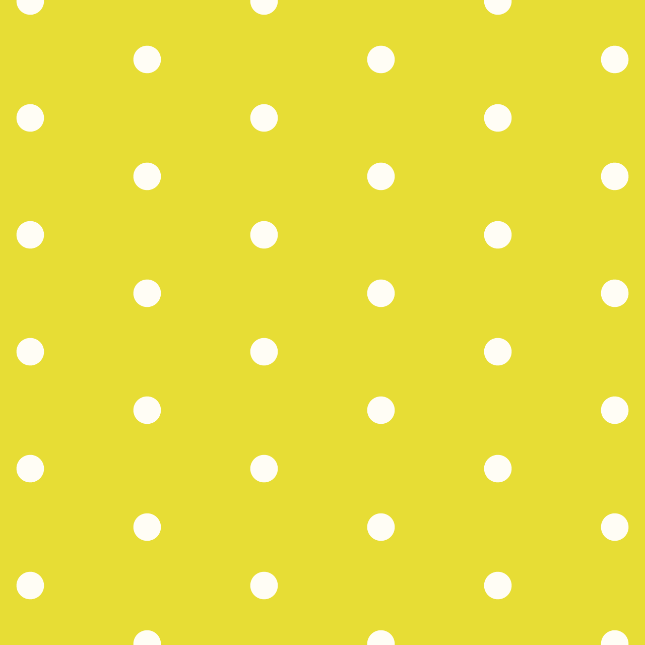 黄色の背景にシンプルなクリーム色のドットのパターン